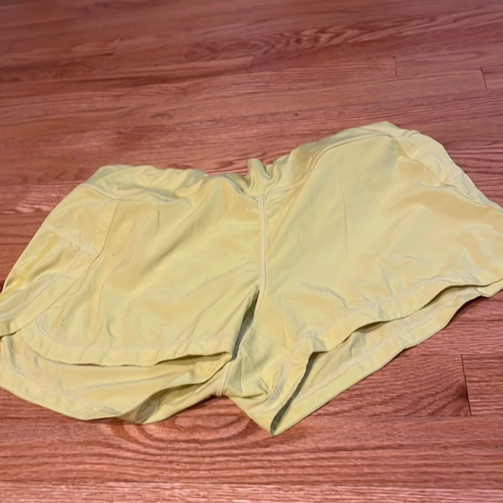 Bright yellow athleta running shorts RN #54023 style #983377 #64684